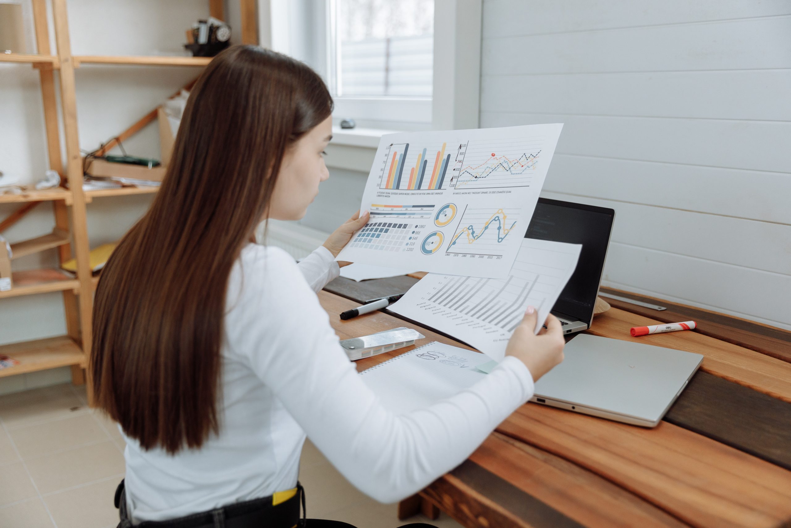 Woman looking at reports