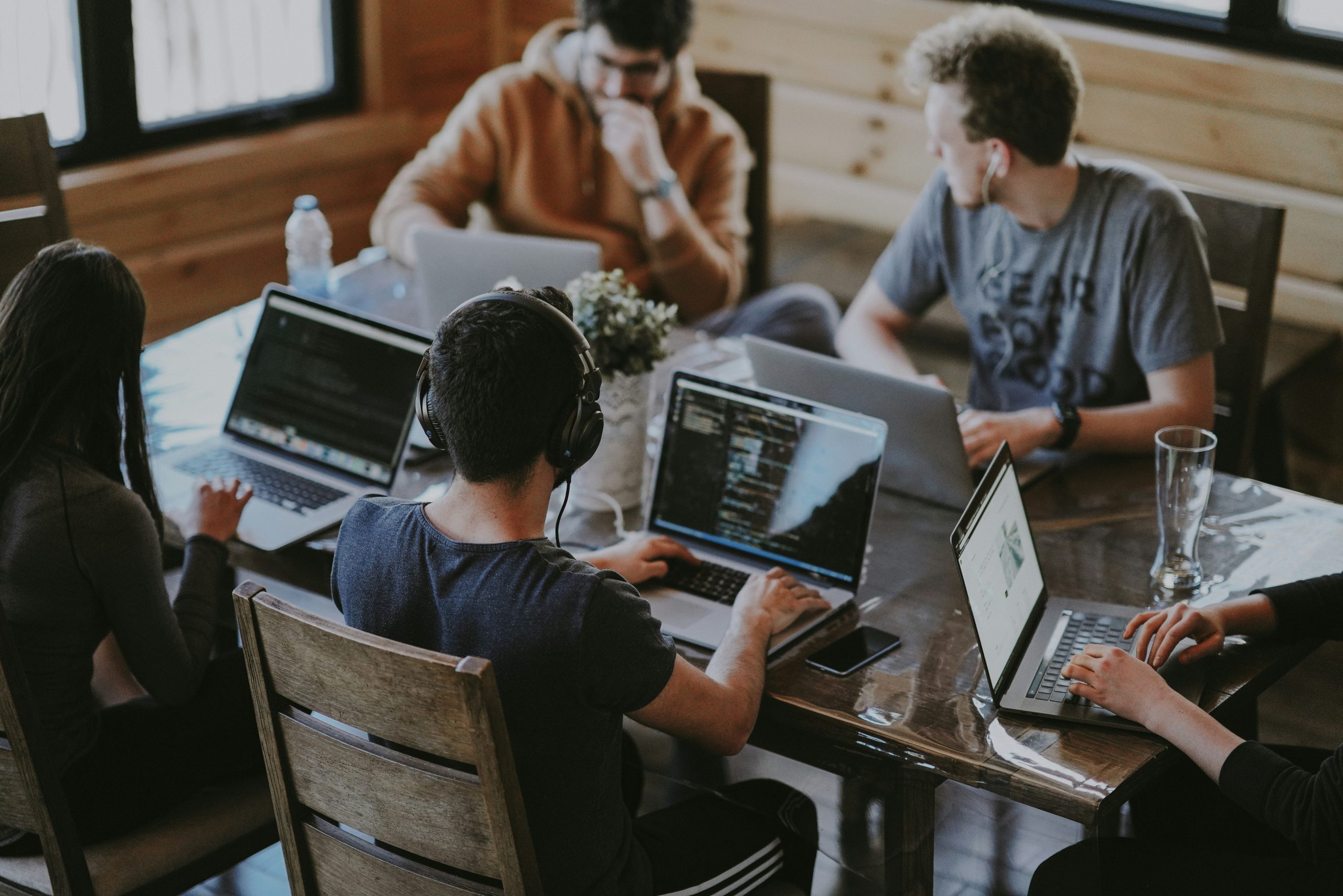 image of group of people with laptops